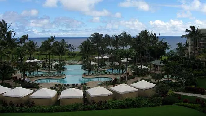 Gardens and pools of Kapalua Resort below the West Maui mountains.