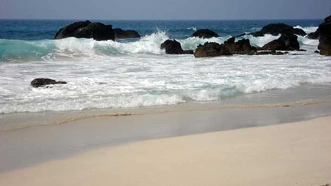 White sand and breaking surf at Maniniowali Beach on Kua Bay, Kona.