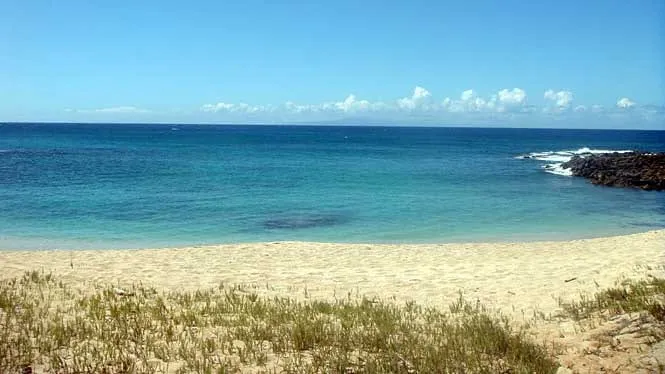 Kaupoa Beach’s white sand and clear water at Molokai’s west end.