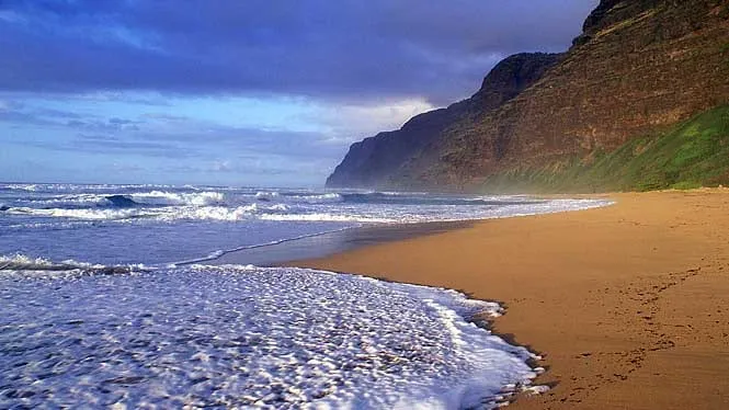 Polihale’s long white sand beach running toward the Na Pali cliffs in West Kauai.